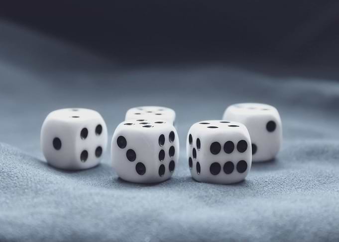Dice on Blue Fabric