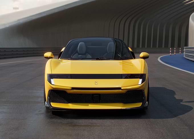 Yellow Ferrari on a Racetrack