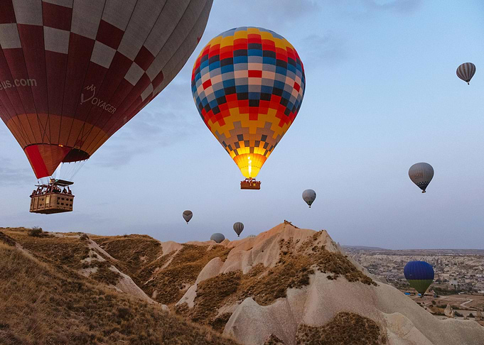Hot Air Balloons over Cappadocia Landscape