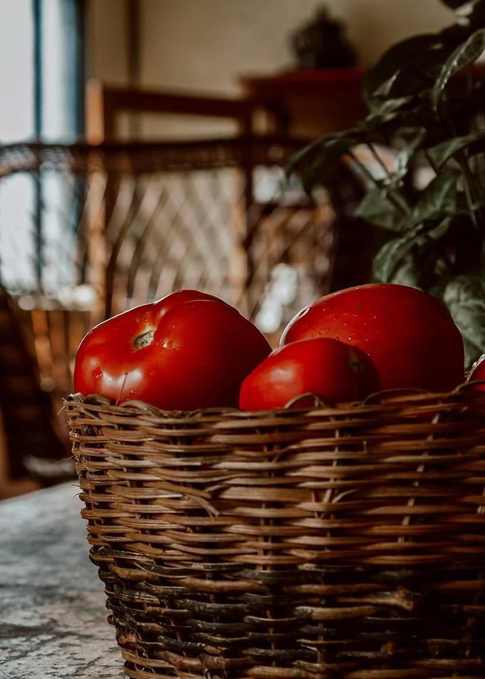 Tomatoes in a Woven Basket