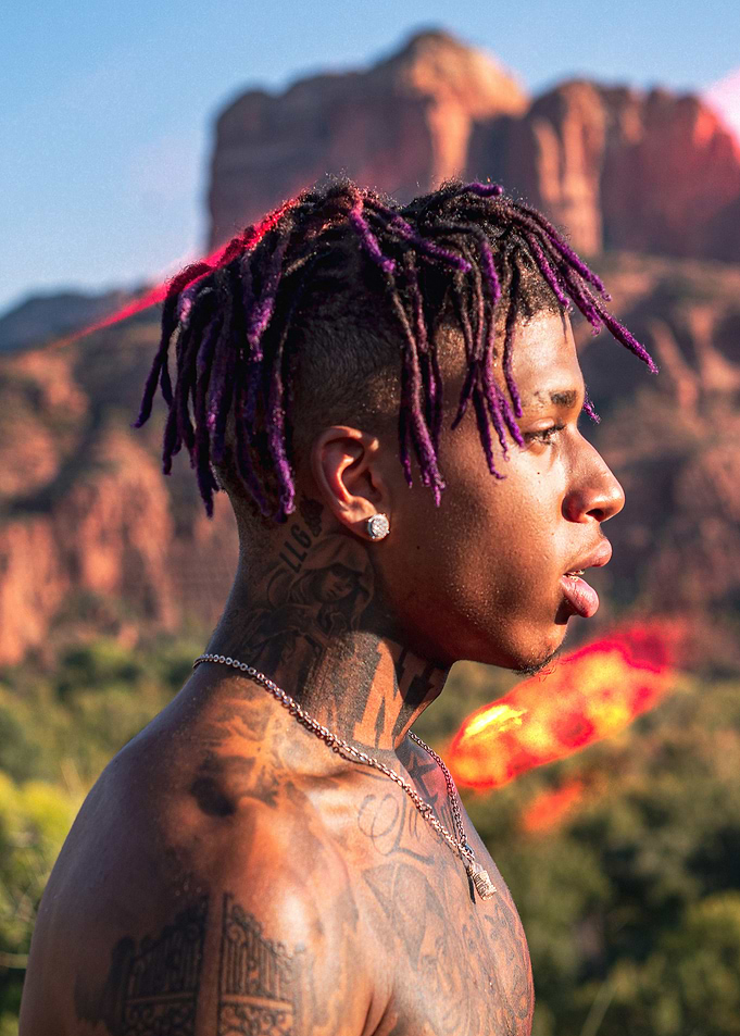 nle choppa portrait with mountain backdrop