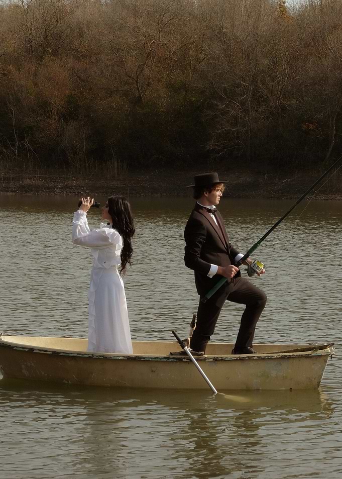 Victorian couple in a rowboat