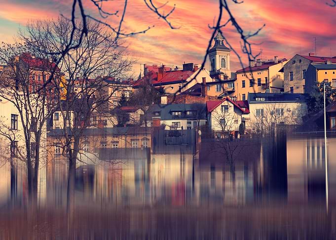 European Cityscape at Sunset with Reflection