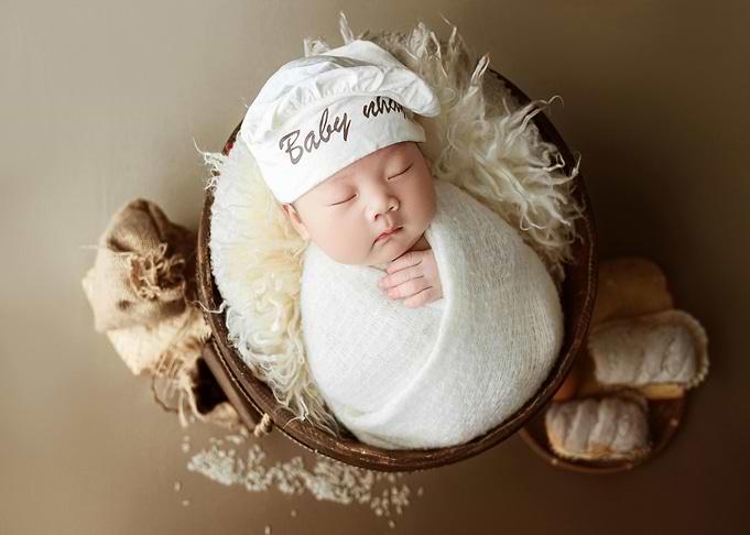 Newborn baby in a basket