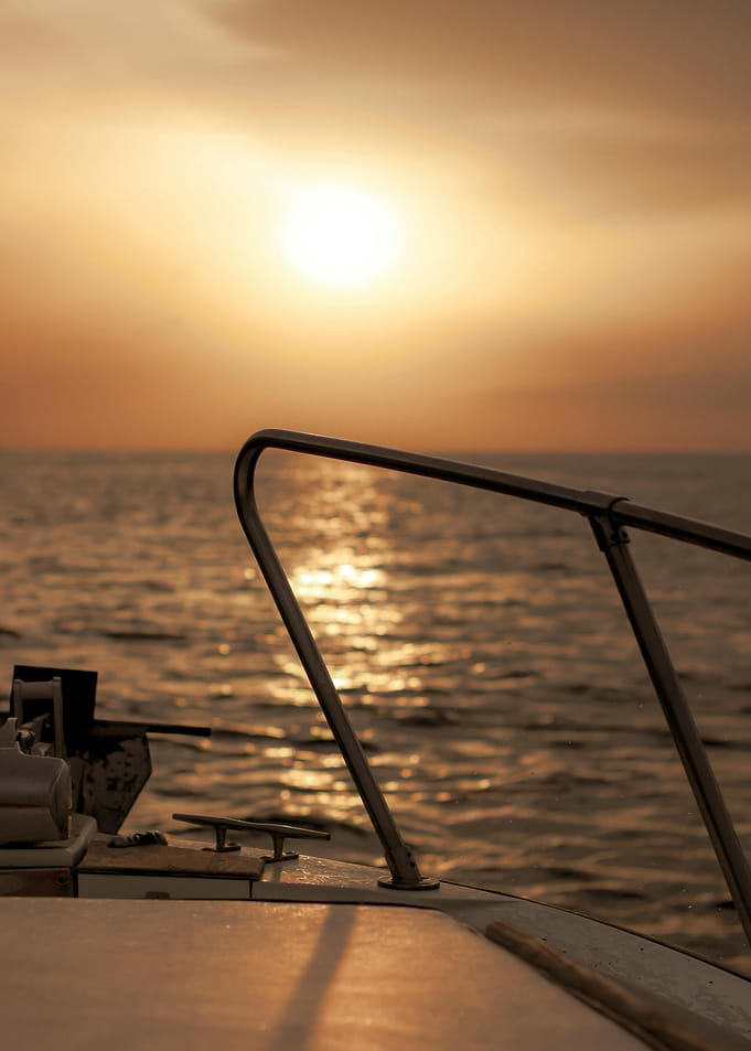Boat at Sunset on the Ocean