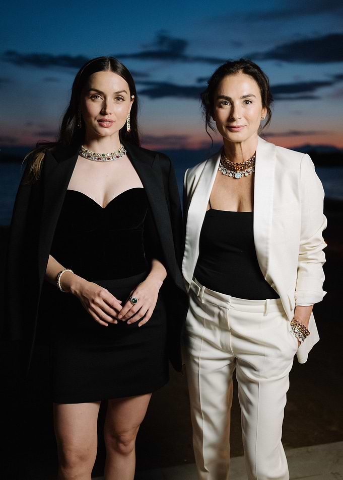 Two women in elegant attire