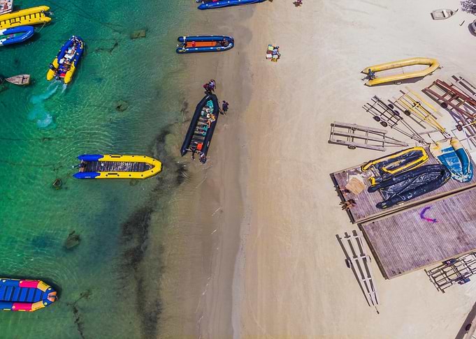 Aerial view of beach with boats