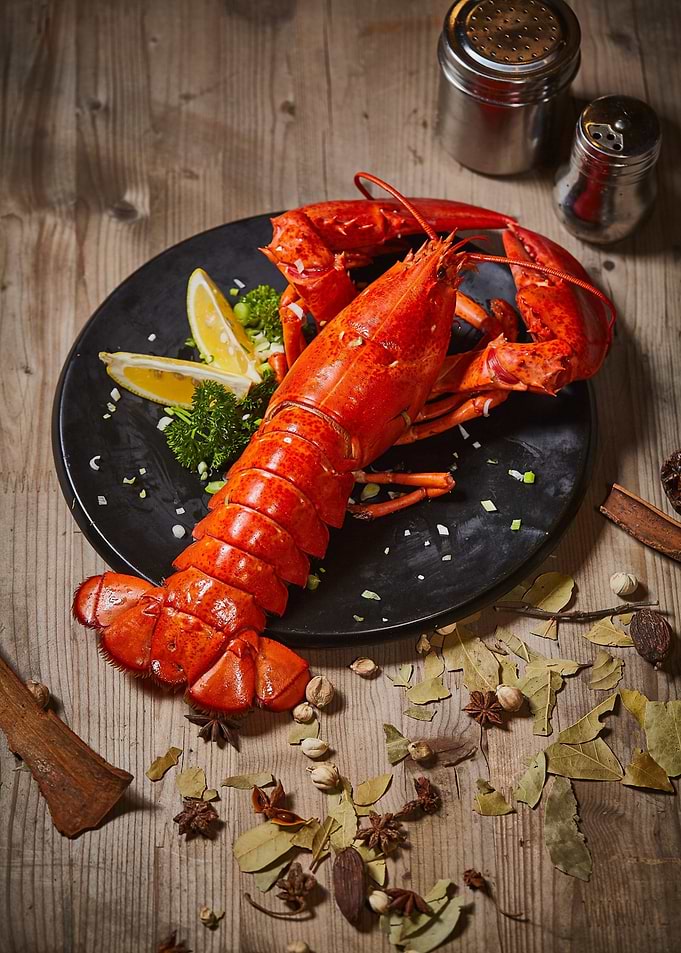 Cooked Lobster on Black Plate