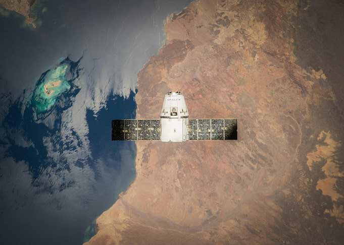 SpaceX Dragon over Earth