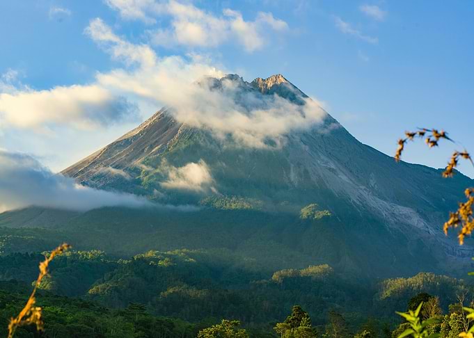 Majestic Mountain Peak with Cloud Cover