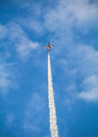 Aerobatic Plane with Smoke Trail