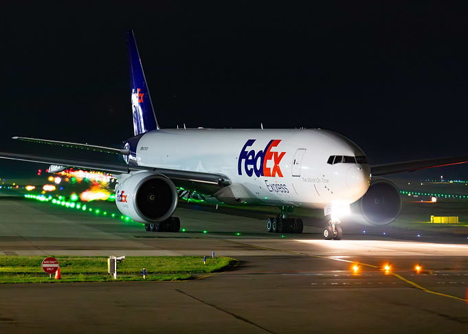 FedEx Airplane on Runway at Night