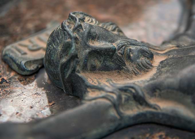 Crucifix Detail: Bronze Sculpture of Jesus