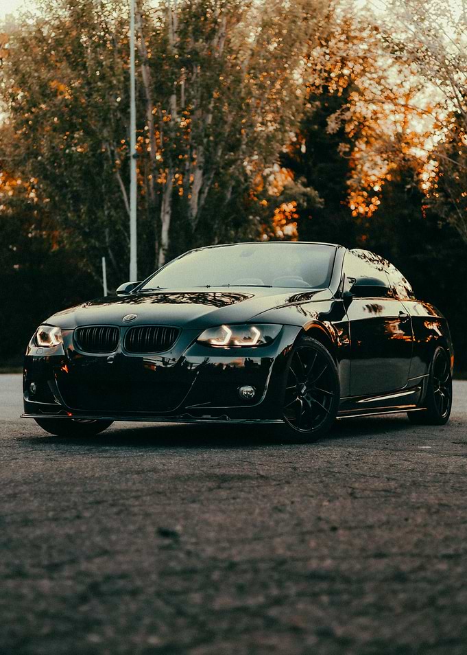 Sleek Black Car on Asphalt