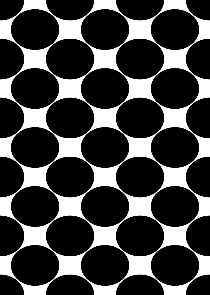Black circles on white background pattern