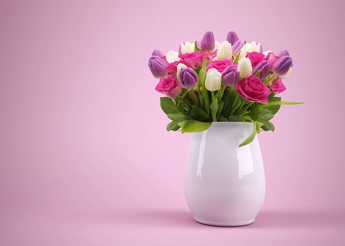 Floral arrangement with roses and tulips