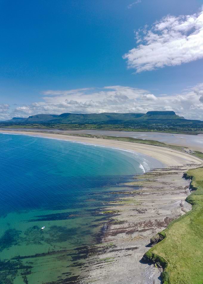 Coastal Landscape with Mountains and Beach