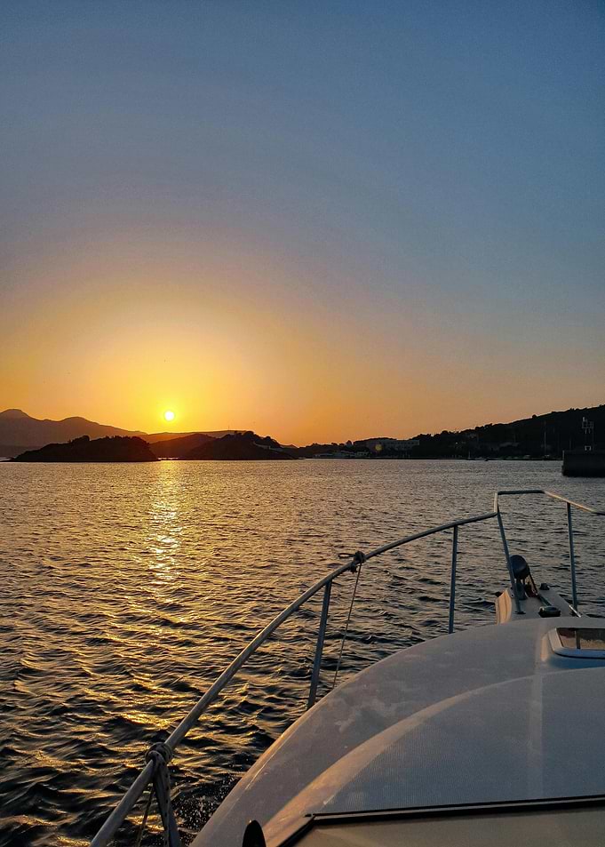 Boat at Sunset on the Water