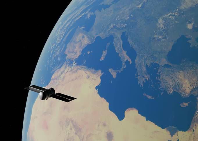 Satellite orbiting Earth from space view