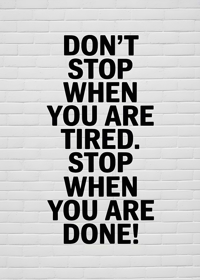 Motivational Text on Brick Wall