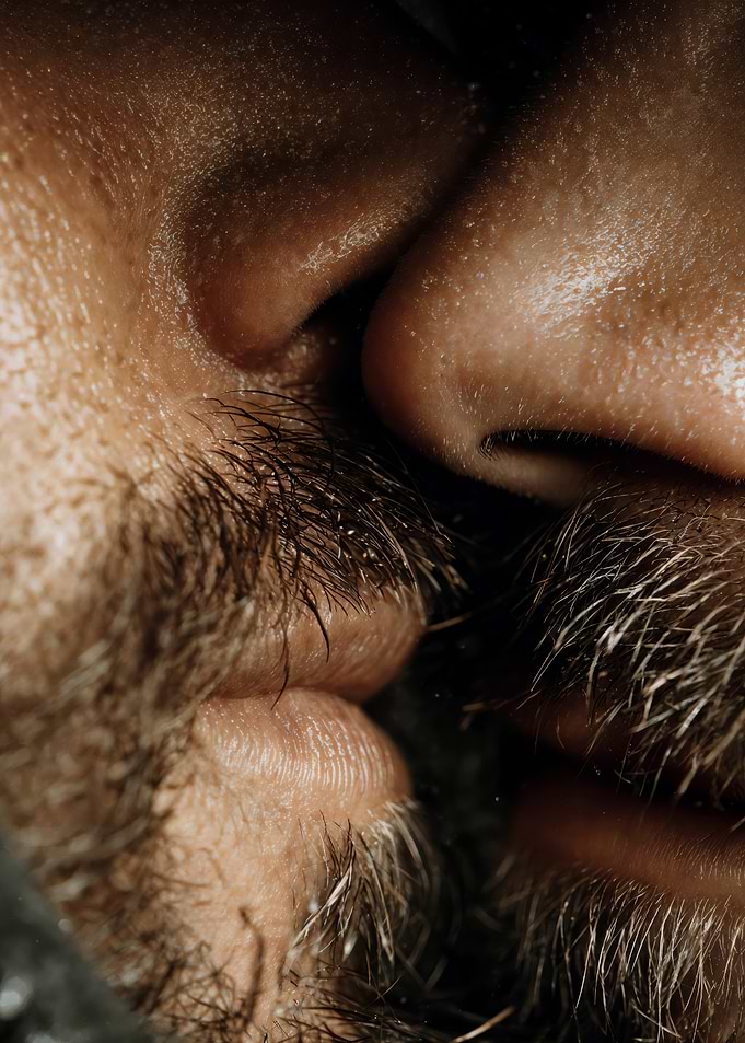 Close-up of Gay Couple faces kissing