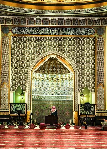 Mosque Interior with Person Praying