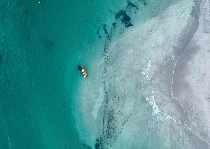 Aerial view of boat near beach