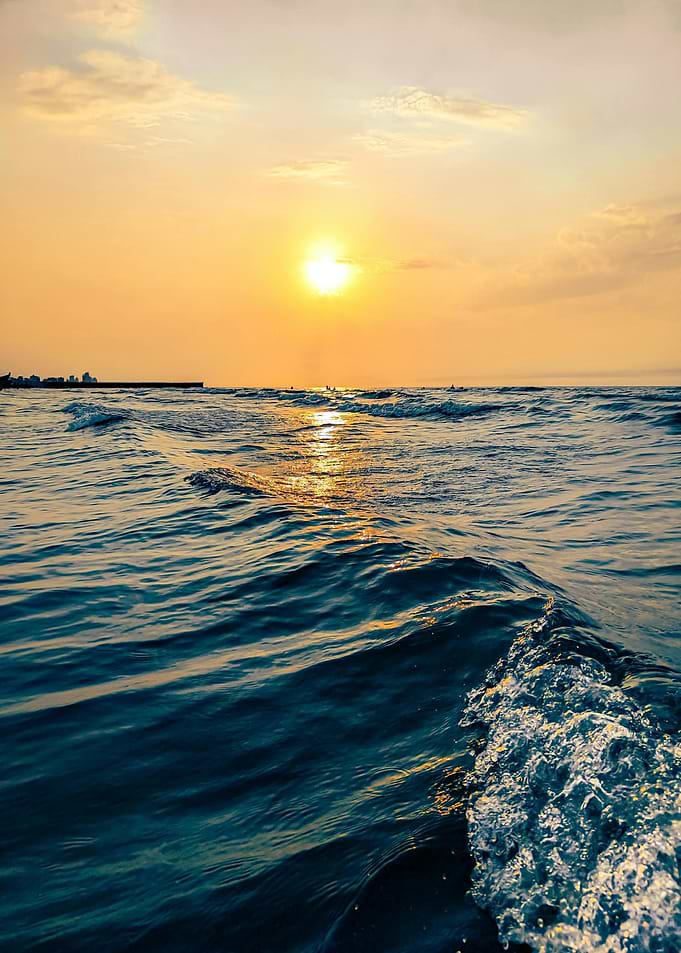 Ocean waves at sunset