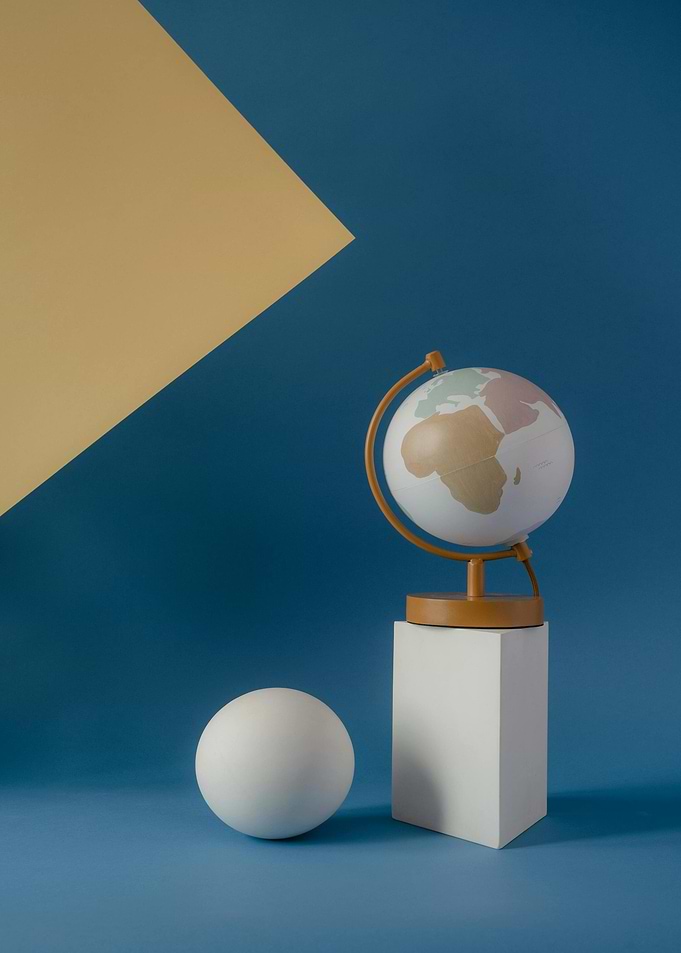 Globe on a pedestal with sphere