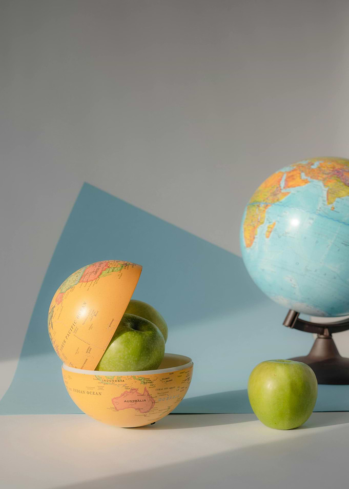 Globe, Apples, and a Slice of Earth