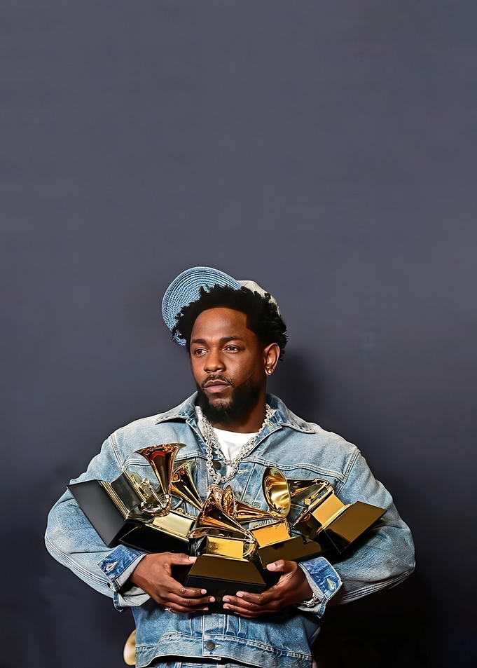 Kendrick Lamar with Grammy Awards