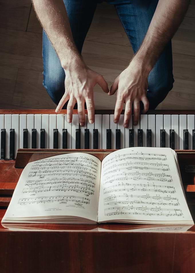 Piano Player with Sheet Music
