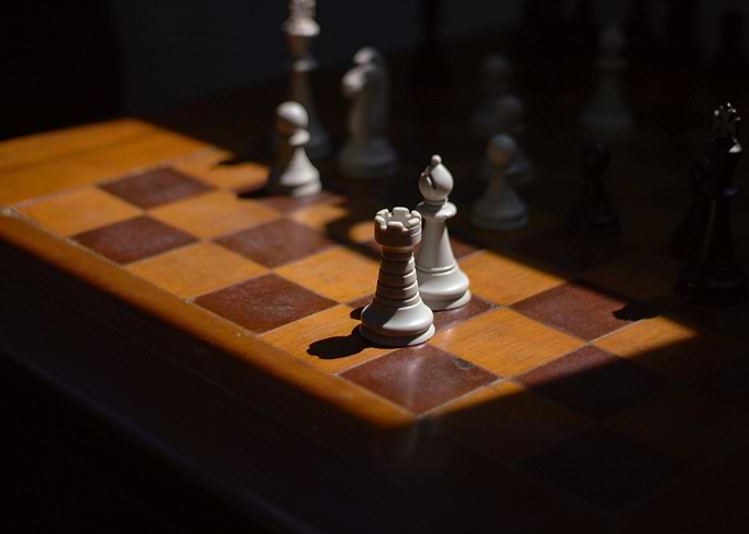 Chessboard with Pieces in Sunlight