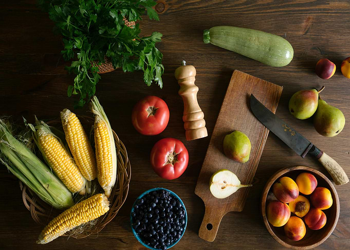 Fresh Produce Still Life on Wood