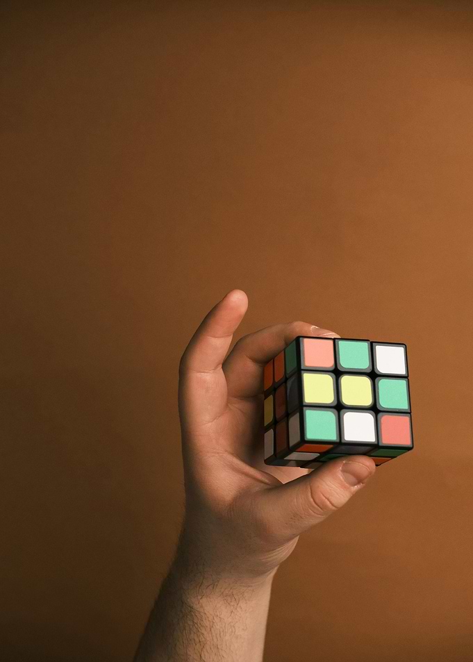 Hand holding a Rubik's Cube