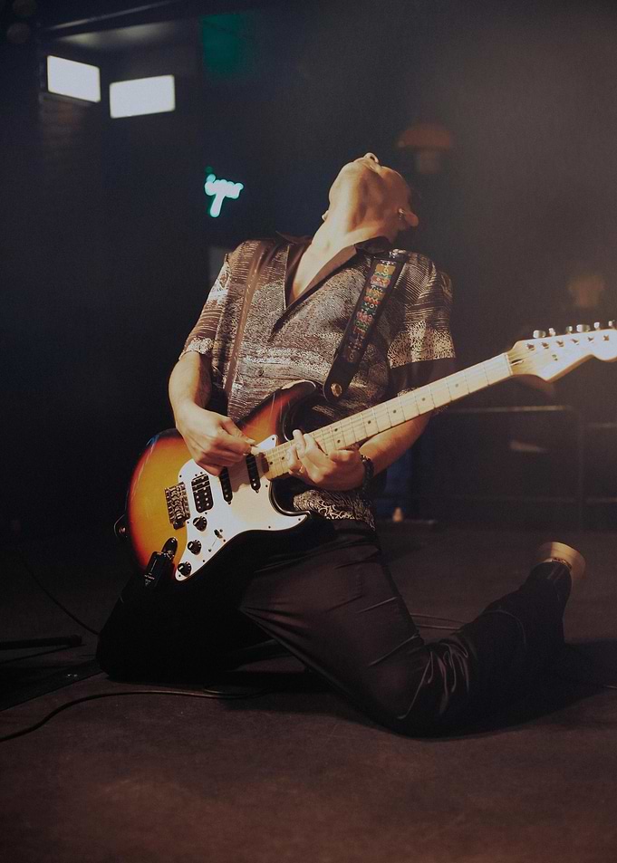 Guitarist performing on stage