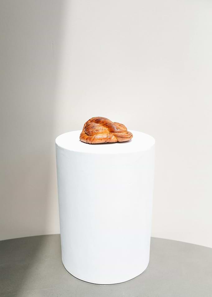 Challah Bread on White Pedestal