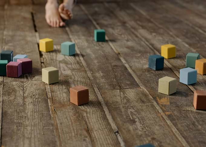 Colorful Wooden Blocks on Wooden Floor
