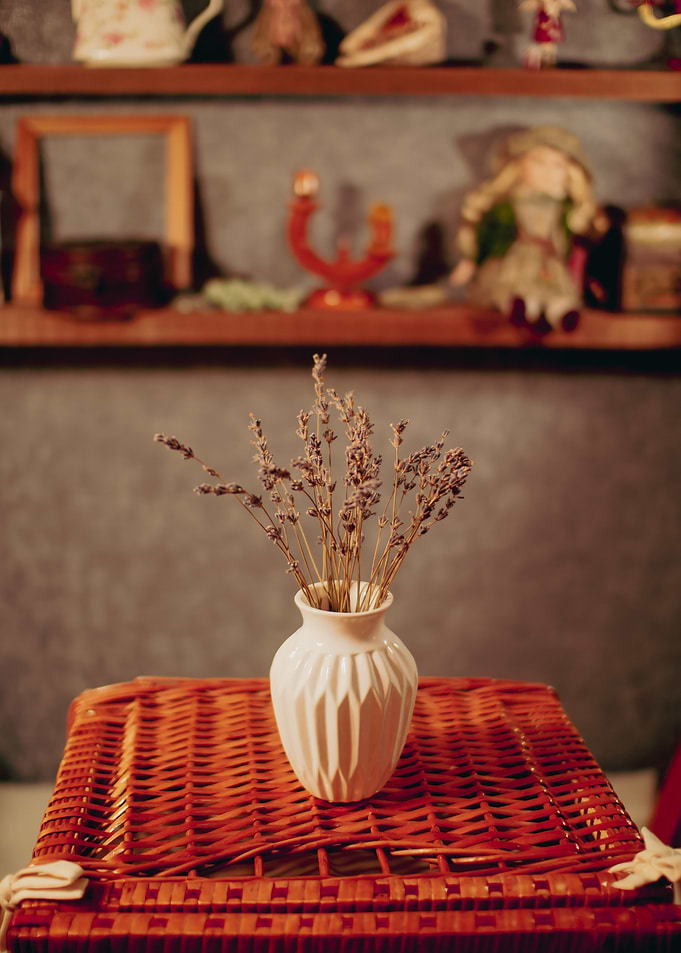 Dried Lavender in Vase on Wicker Table