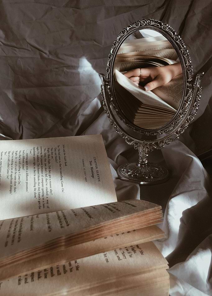 Book and Mirror Still Life