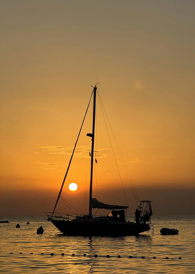 Sailboat Silhouette at Sunset