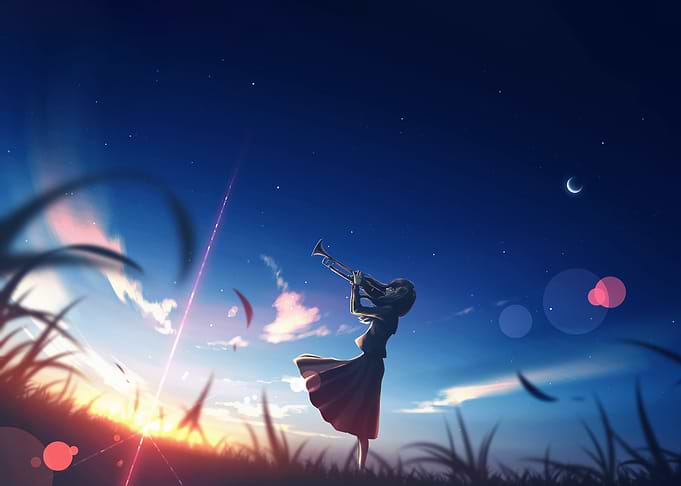 Girl playing trumpet at sunset