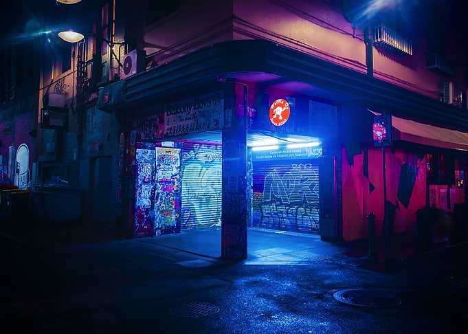 Neon-lit Urban Alleyway at Night
