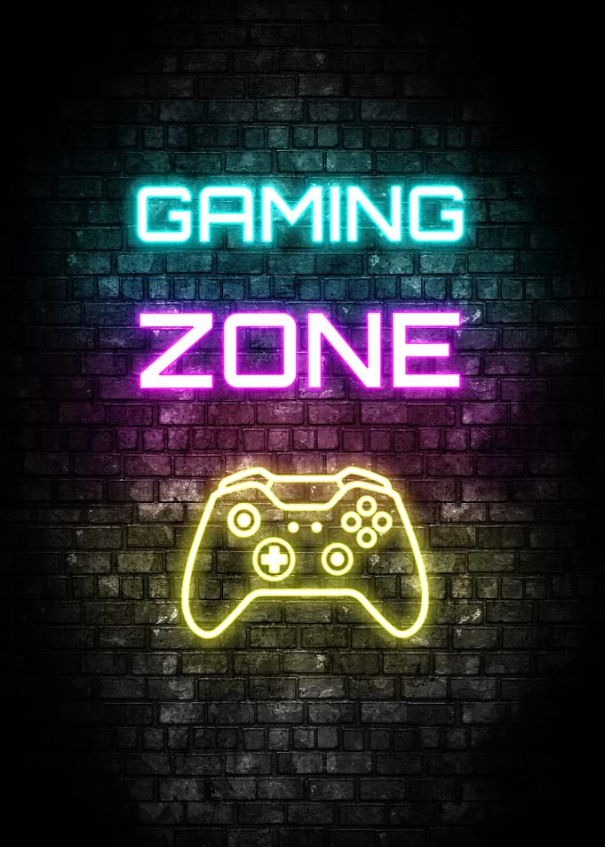 Gaming Zone Neon Sign on Brick