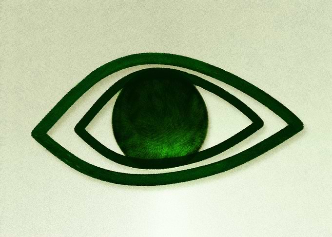 Green Eye Symbol on Textured Background