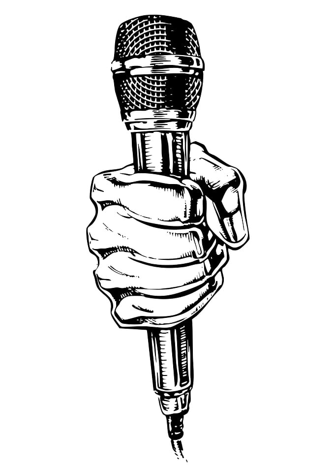 Hand holding microphone black and white