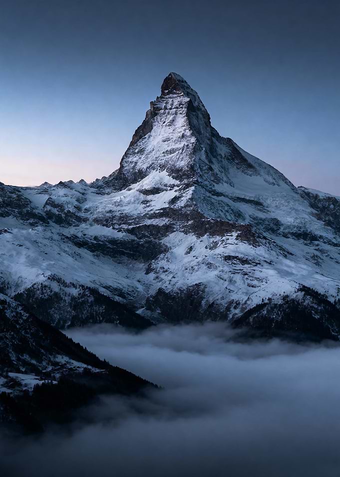 Snowy Mountain Peak at Dusk