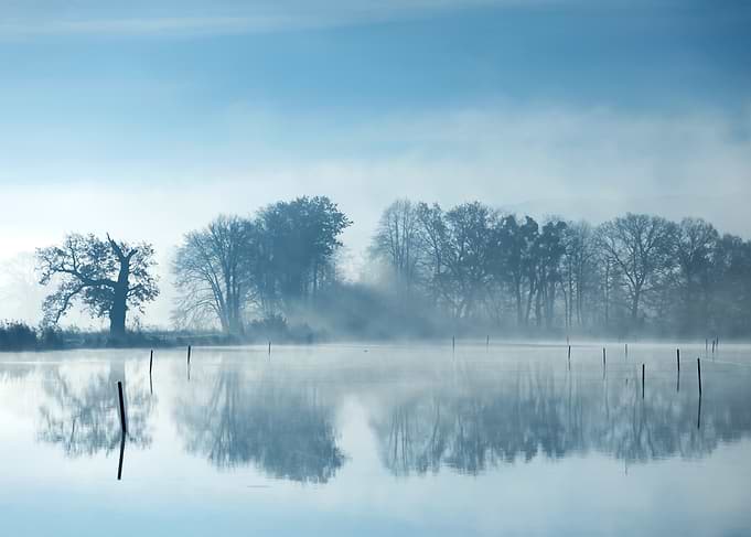 Misty Lake Reflection