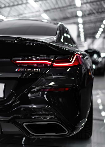 Black BMW M850i Rear View
