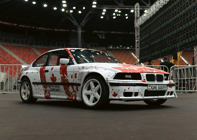White BMW with Canadian Flag Design